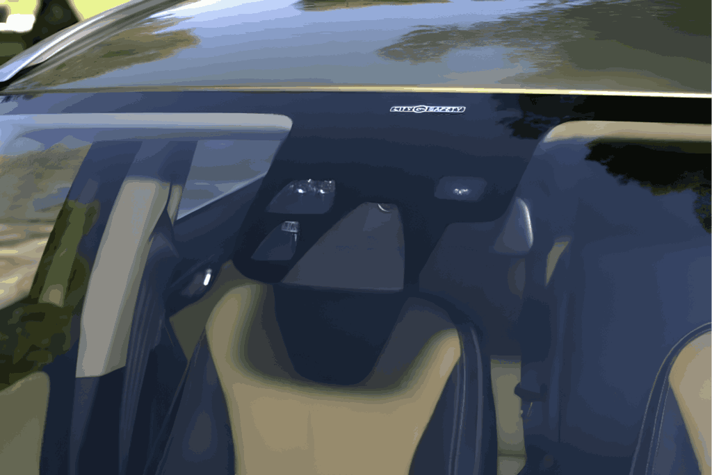Advanced Driver Assistance System sensors on a car windshield.