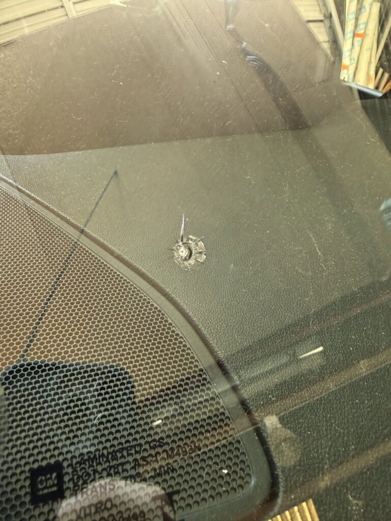 Windshield Chip Repair: DIY Kits vs. Professional Service 4 Close-up windshield chip damage for repair comparison